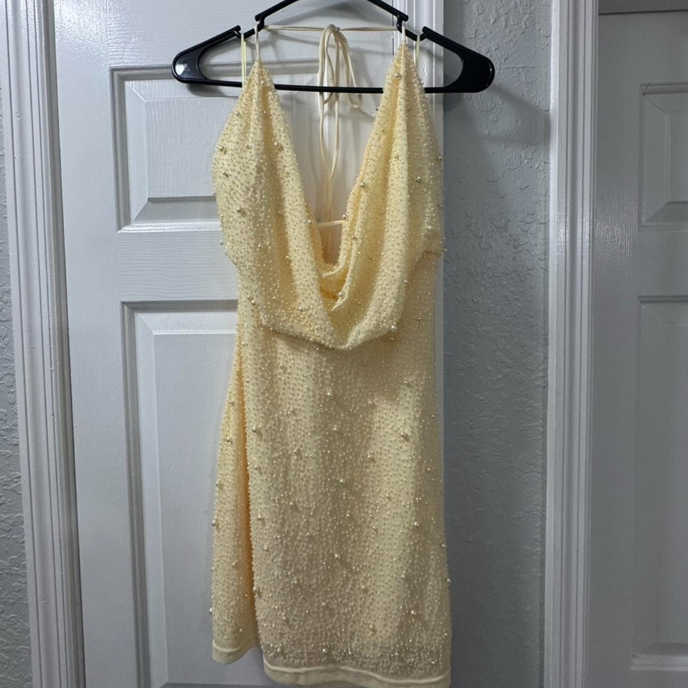 Yellow pearled dress